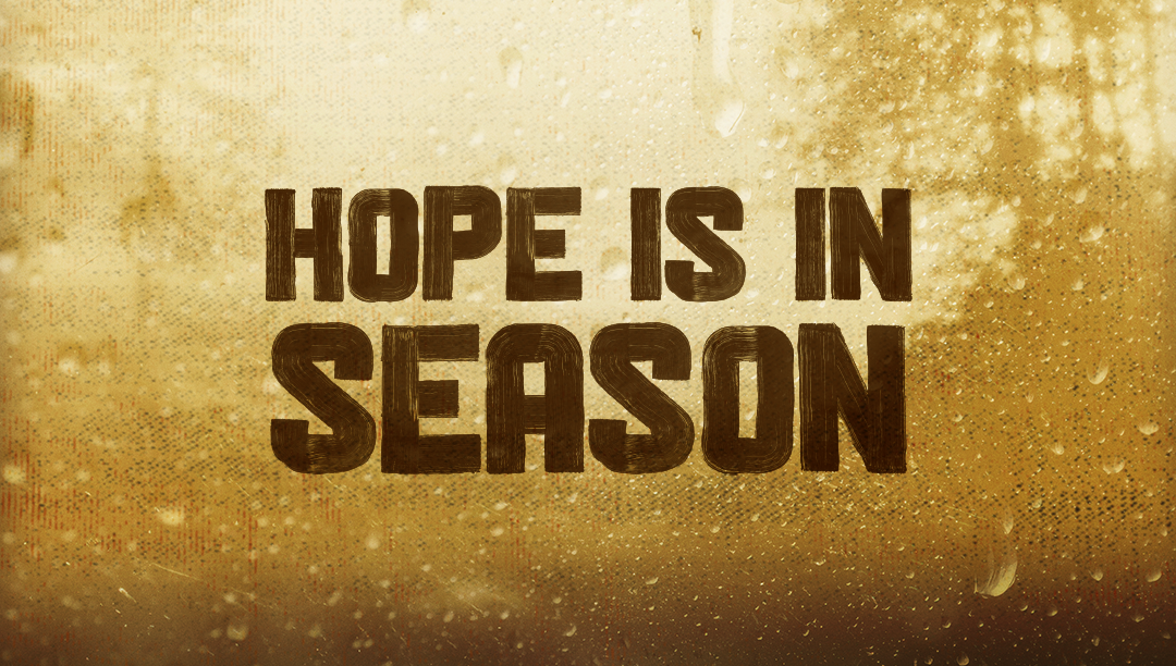tan rainy picture with handpainted text that says "Hope is in season"